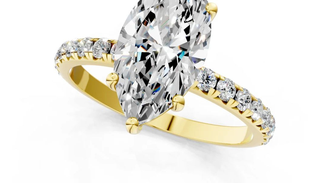 Yellow gold Marquise Cut Diamond Solitaire Ring